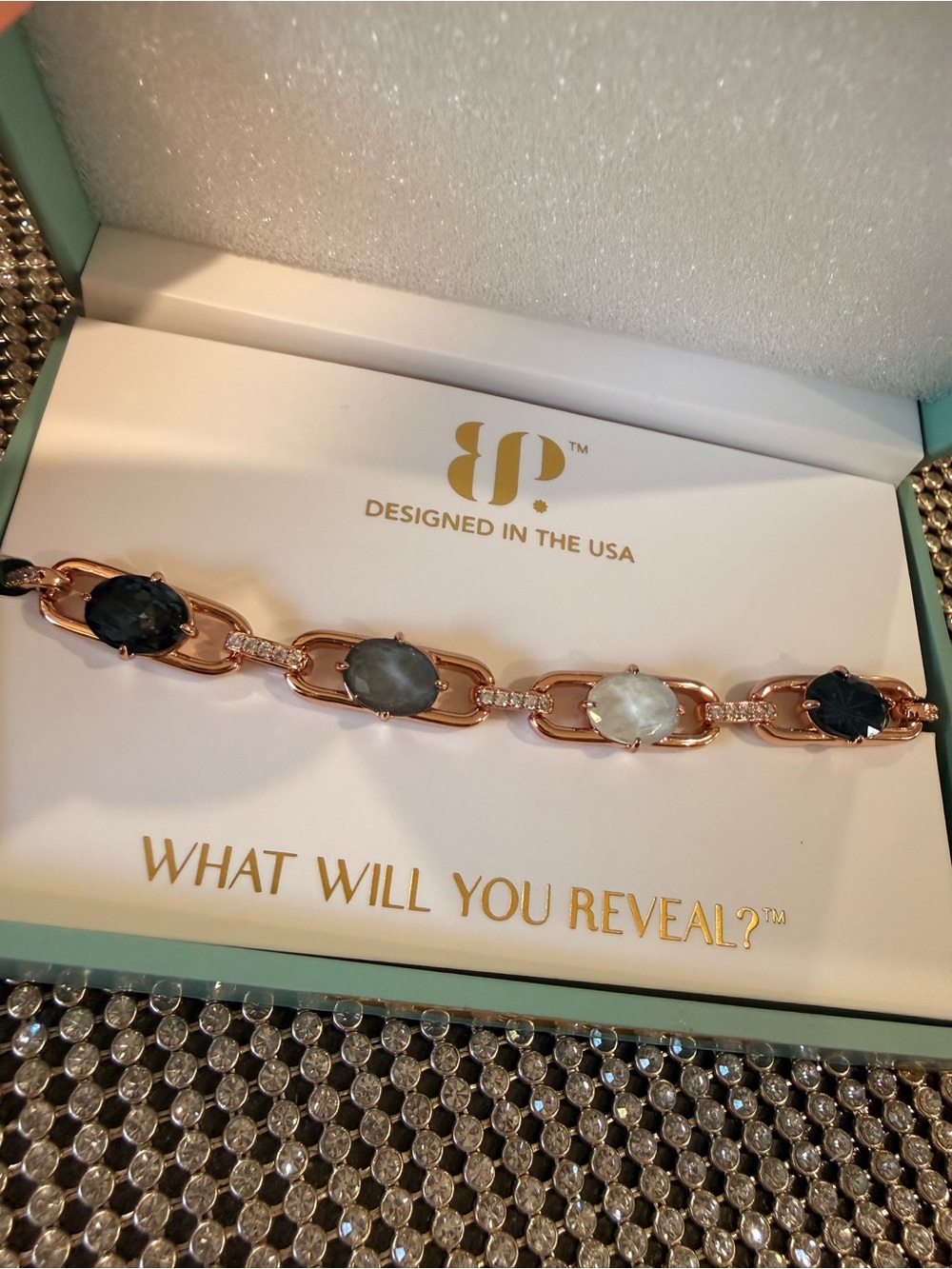 Rose Gold Link Bracelet with Blue, Gray and White Gem Accents